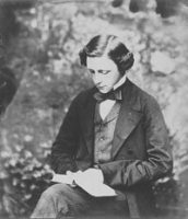 Lewis Carrow sitting and reading a book